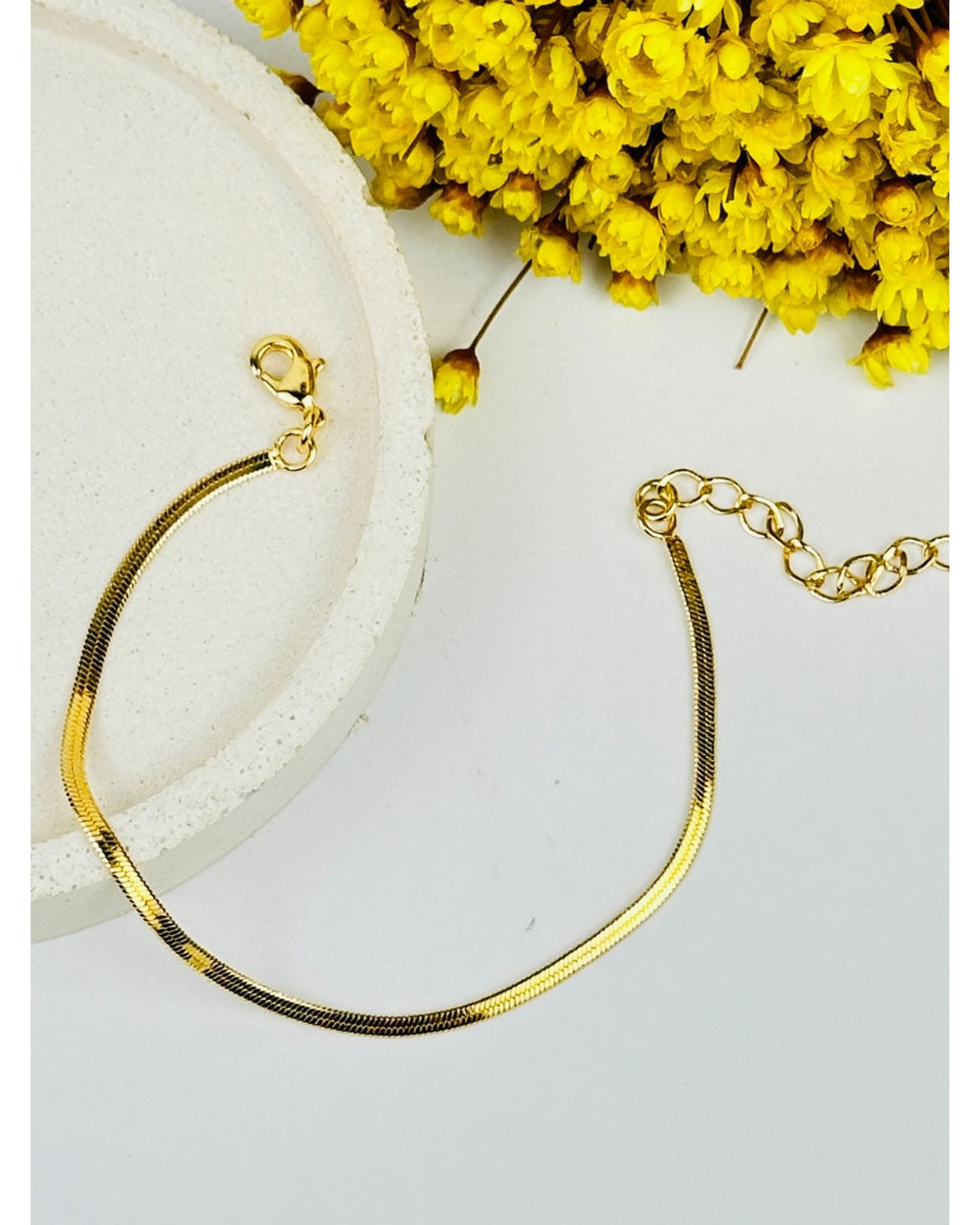 Pulseira delicada Fita laminada 2mm folheada em ouro 18k